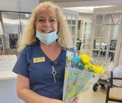 Staff Spotlight-Blonde with Flowers